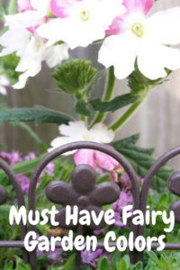 Pretty pink and white flowers with the blog title Must Have Fairy Garden Colors