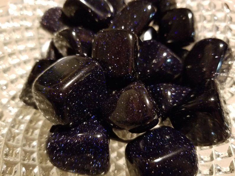 Several pieces of glittery Blue Goldstone